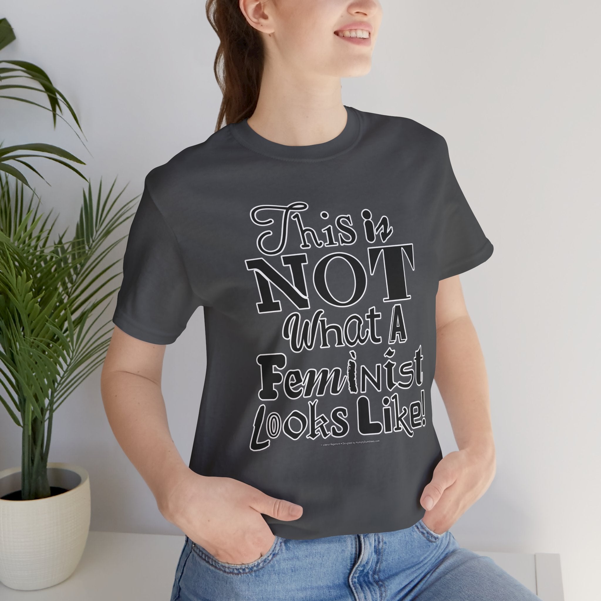 This Is NOT What A Feminist Looks Like - Unisex Soft Cotton Short Sleeve T-Shirt
