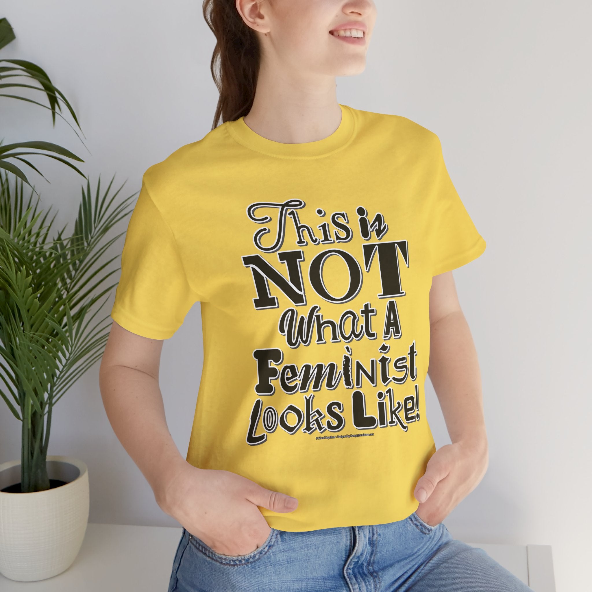 This Is NOT What A Feminist Looks Like - Unisex Soft Cotton Short Sleeve T-Shirt