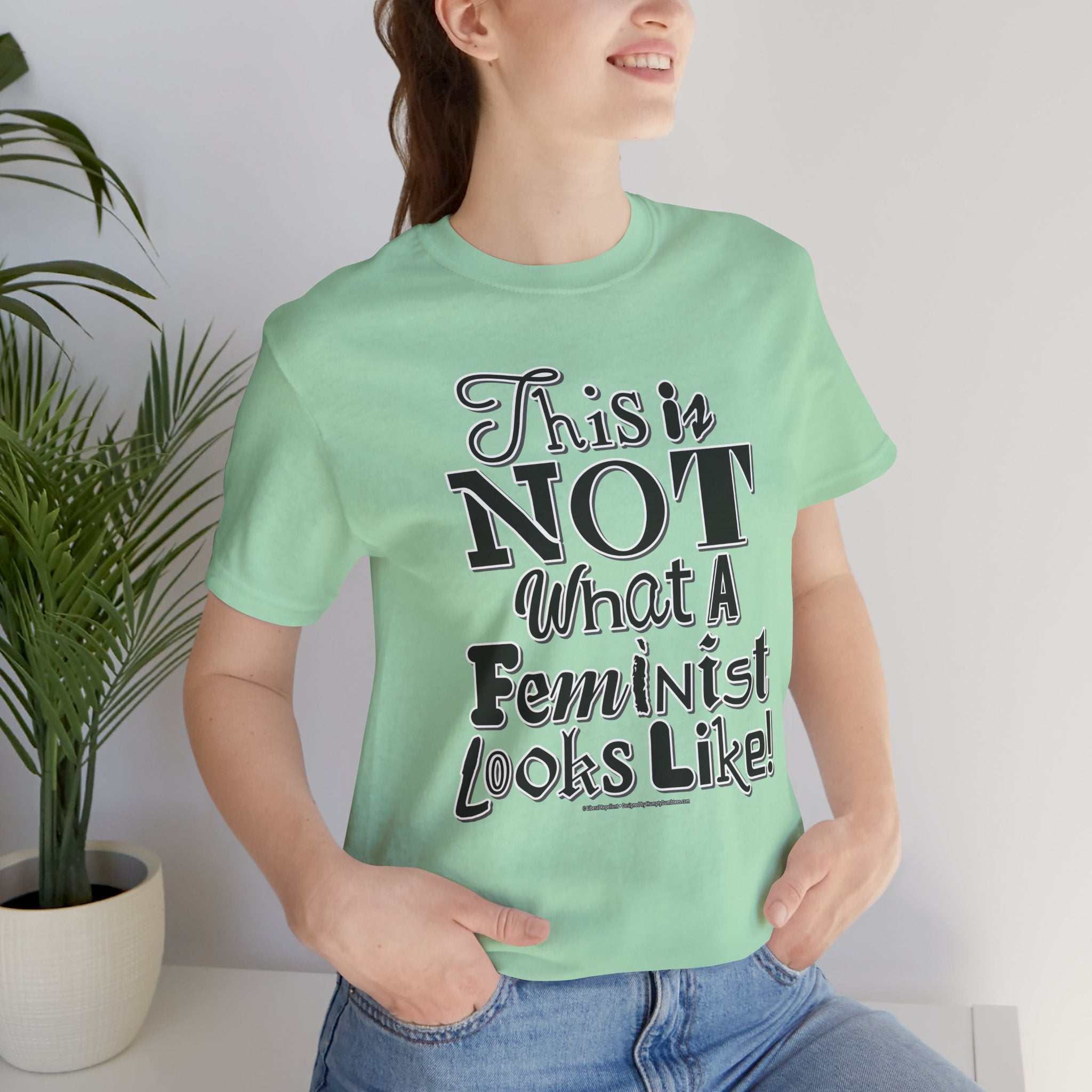 This Is NOT What A Feminist Looks Like - Unisex Soft Cotton Short Sleeve T-Shirt