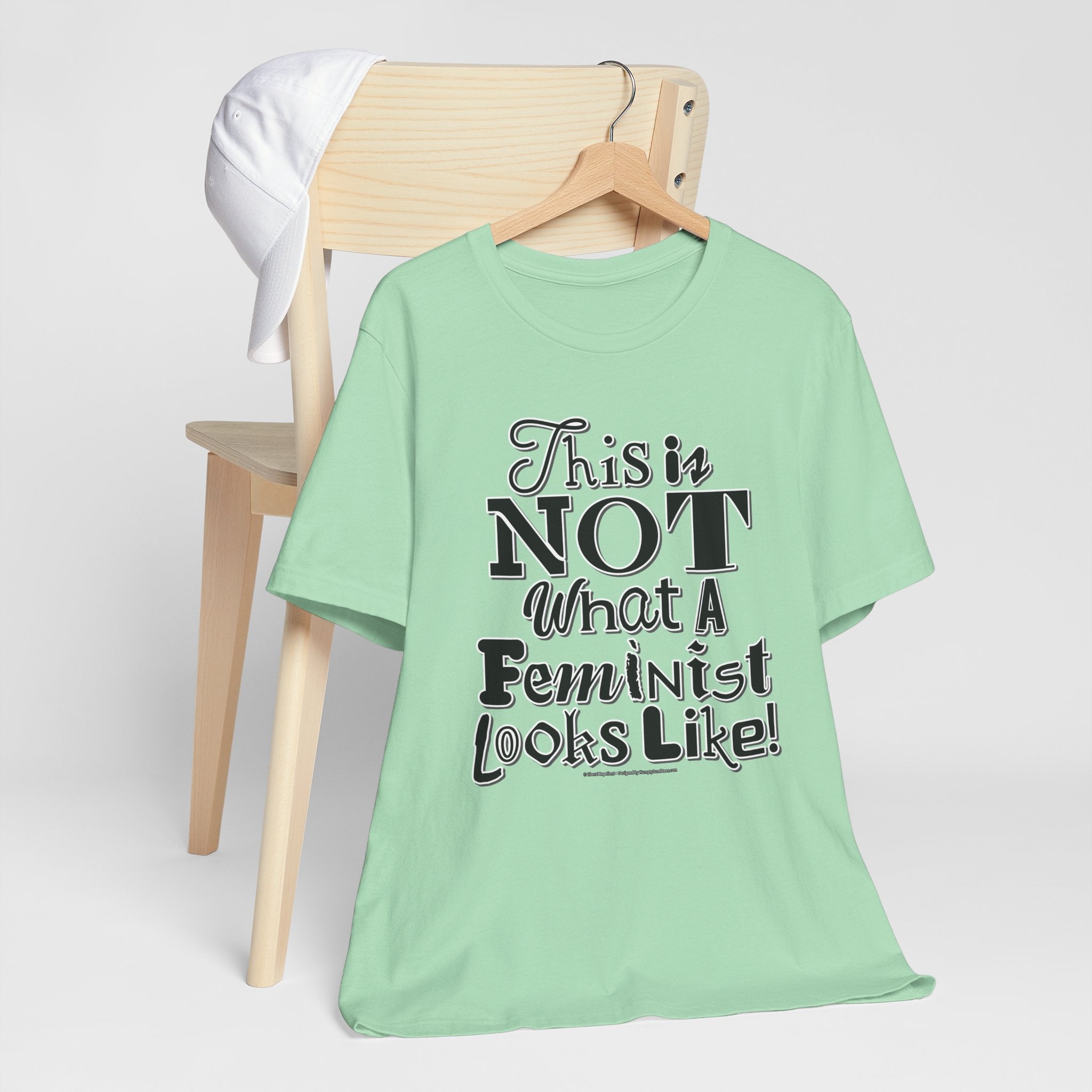 This Is NOT What A Feminist Looks Like - Unisex Soft Cotton Short Sleeve T-Shirt
