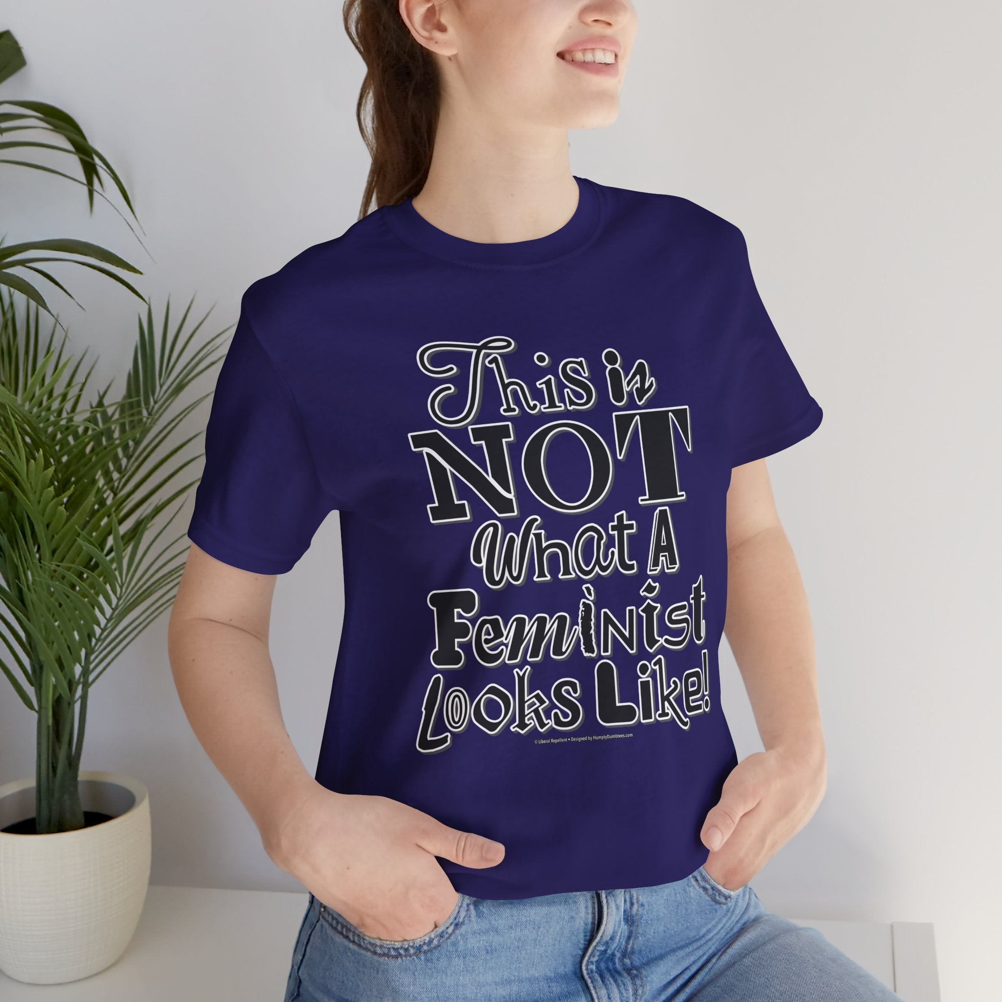 This Is NOT What A Feminist Looks Like - Unisex Soft Cotton Short Sleeve T-Shirt