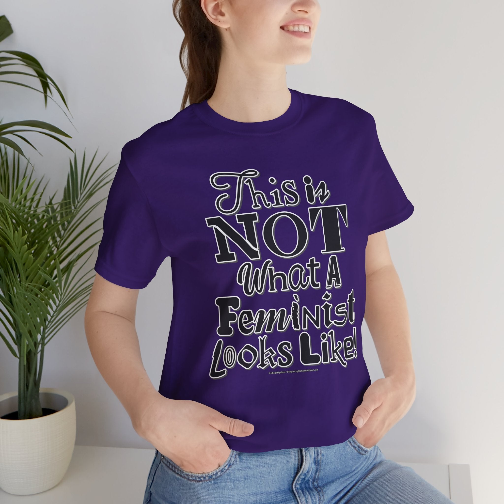 This Is NOT What A Feminist Looks Like - Unisex Soft Cotton Short Sleeve T-Shirt