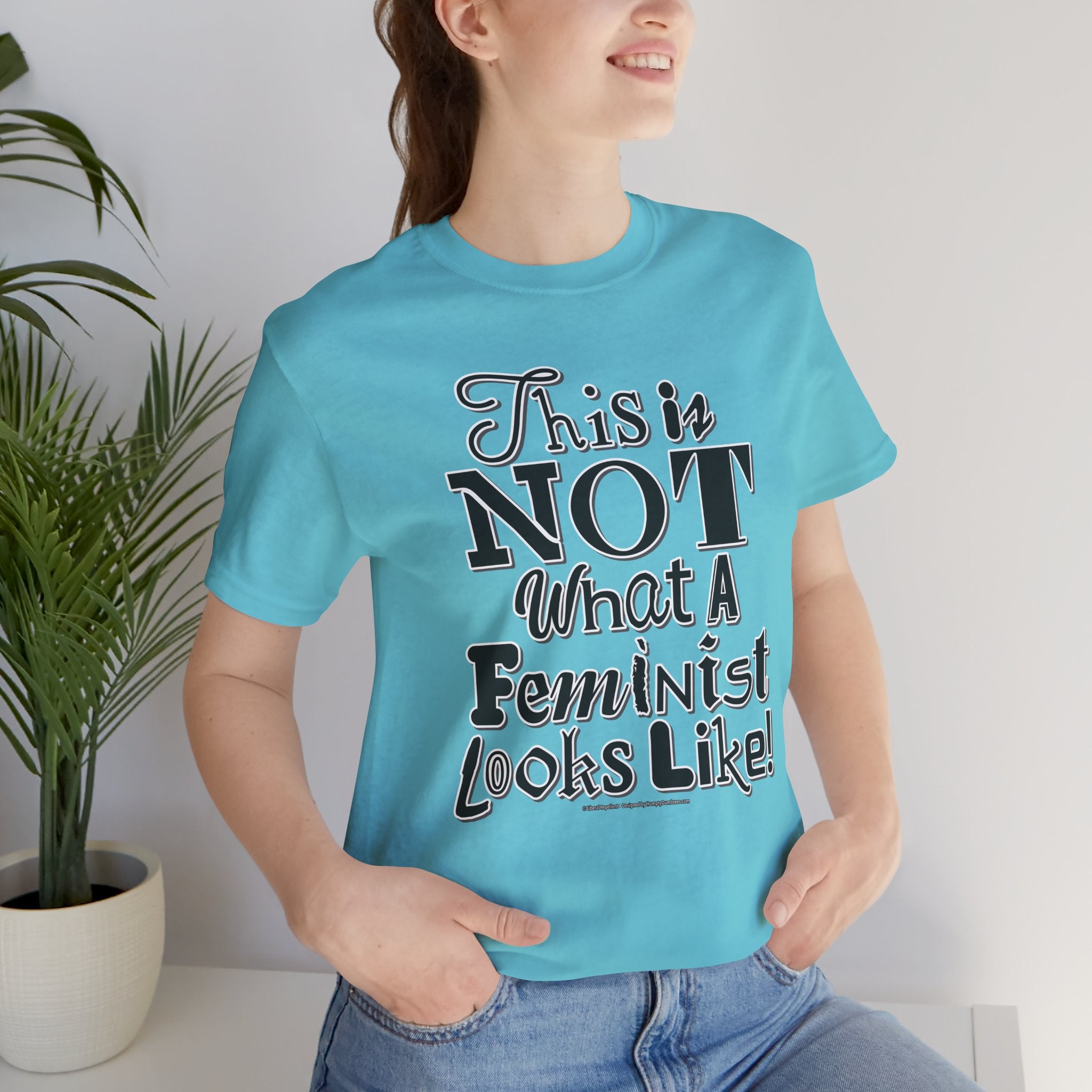 This Is NOT What A Feminist Looks Like - Unisex Soft Cotton Short Sleeve T-Shirt